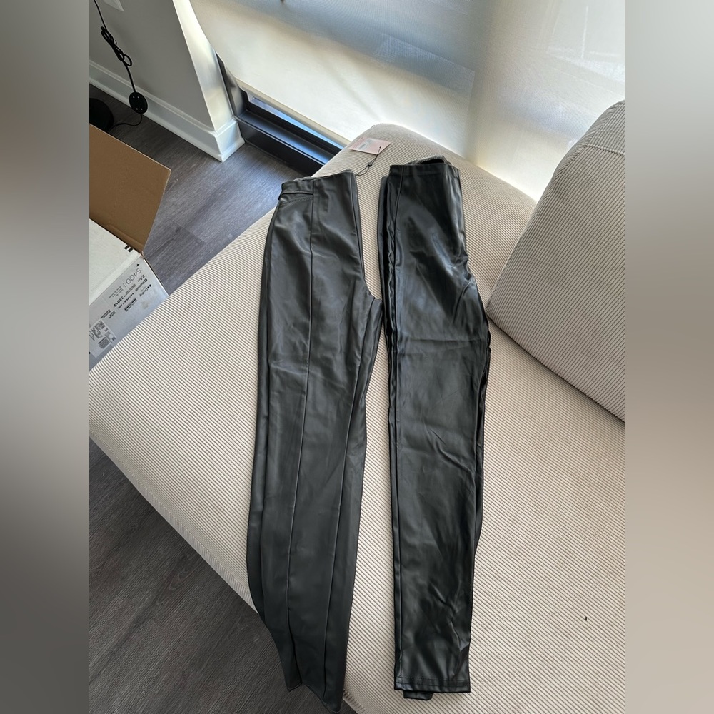 2 pairs of Leather pants.